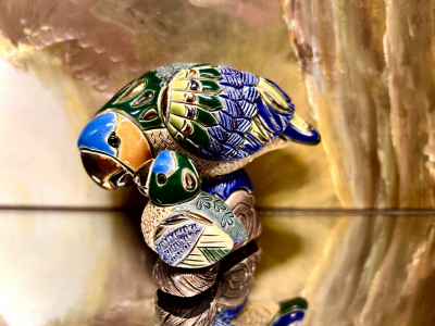 De Rosa Rinconada Papagei mit Papagei-Baby